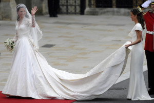 Kate Middleton waves as she arrives at t