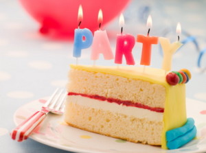 Party Candles on a Slice of Birthday Cake